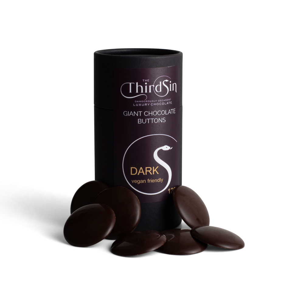 Black cylindrical container of 'The Third Sin' dark chocolate buttons on a white background