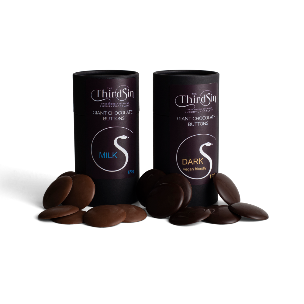 Two black cylindrical containers of ThirdSin chocolate buttons with chocolate buttons in front on a white background.