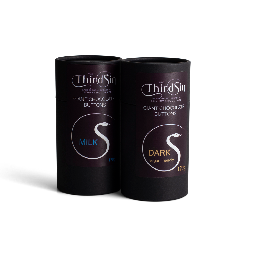 Two black cylindrical containers of 'The Third Sin' chocolate buttons on a white background