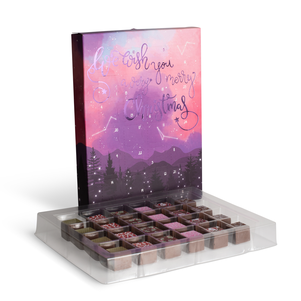 Decorative box with 'Merry Christmas' text and chocolate truffles on a white background. Advent Calendar