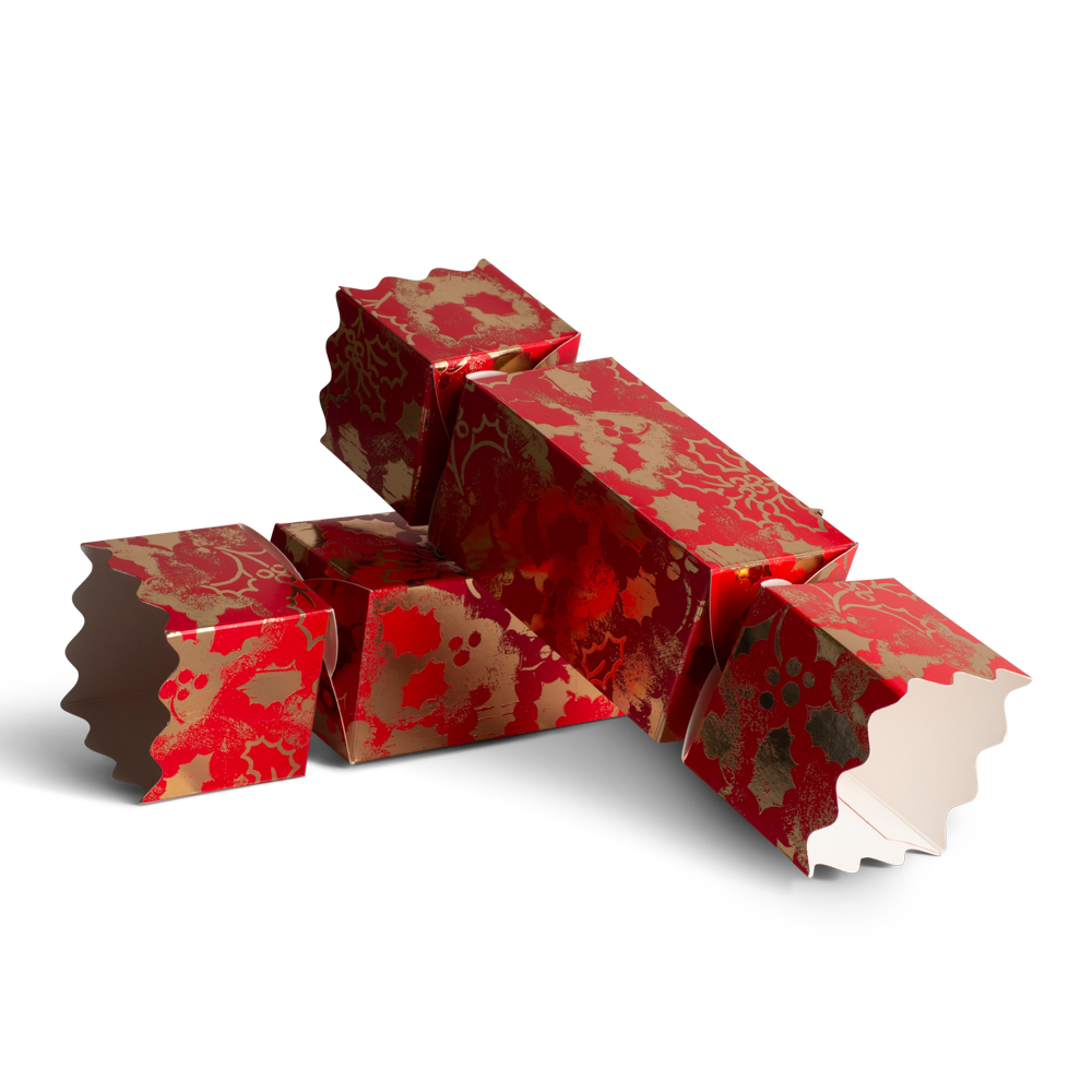 Red and gold patterned christmas cracker boxes on a white background