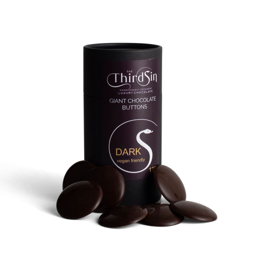 Black cylindrical container of 'The Third Sin' dark chocolate buttons on a white background