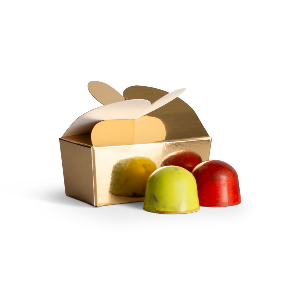 Gold box with three colorful chocolates on a white background