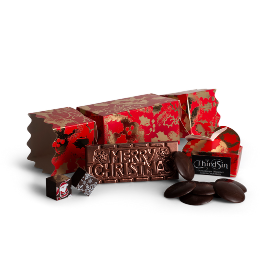 Christmas cracker box Chocolate bars with decorative boxes and 'Merry Christmas' text on a white background